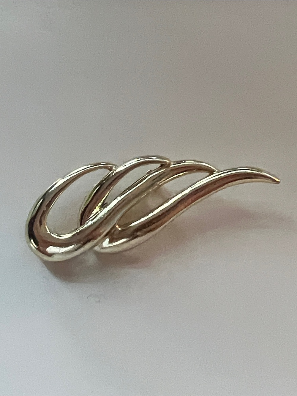 Vintage gold toned brooch wave wing abstract shape